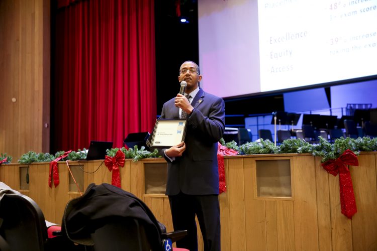 Asa Gordon of the College Board announces East Aurora's achievement