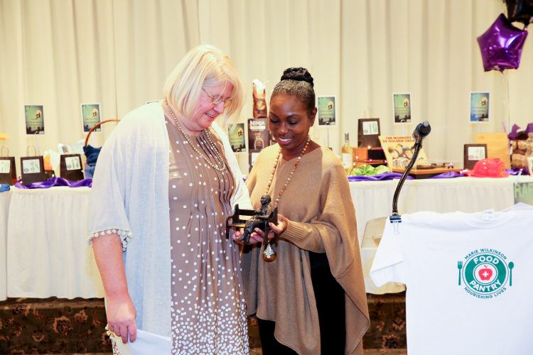 MWFP Board President presents Annette Johnson with award. 