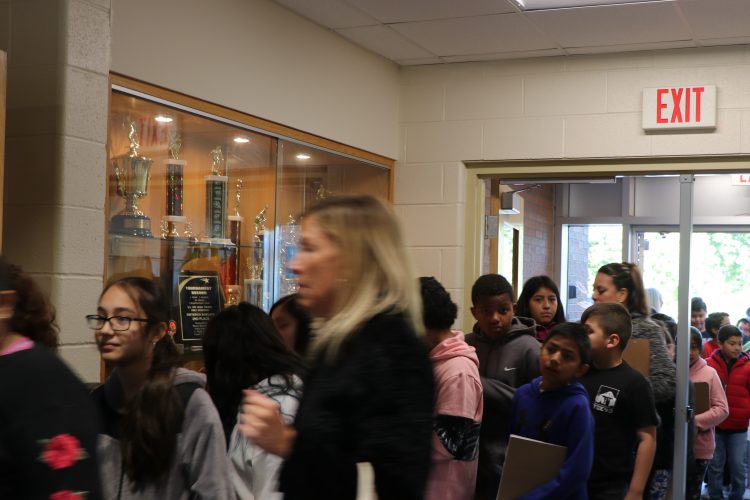 Students file into Dieterich Elementary for the author visit