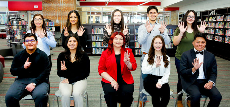 With the help of digital imaging software, the accomplished Tomcats recently posed individually for a "virtual group picture" in the East High School library. 