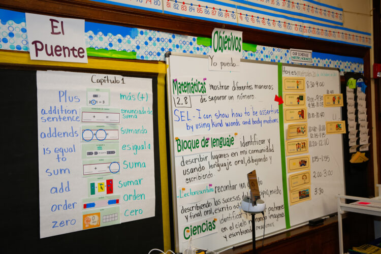 The classroom environment includes illustrations to help students see how some English words are similar to Spanish words. 