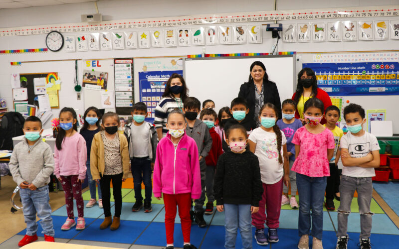 Maiden Lopez and her class pose with the State Superintendent