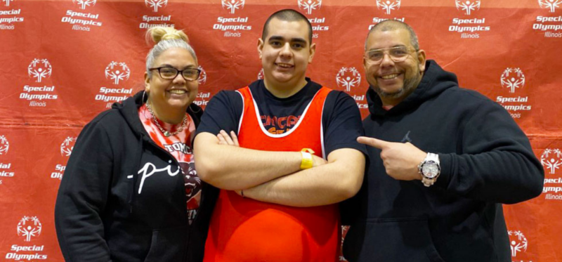 Mota stands with his family of supporters