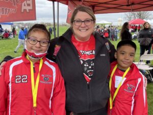 Dariana Cortes, Stephanie Clow (classroom teacher) and Steheart Sander
