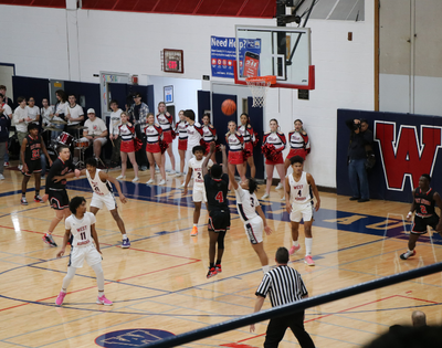 Tomcats Deliver at East-West Basketball Games