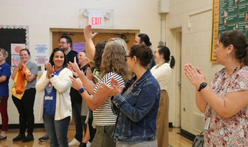 Johnson Elementary staff cheering and celebrating the Exemplary Designation