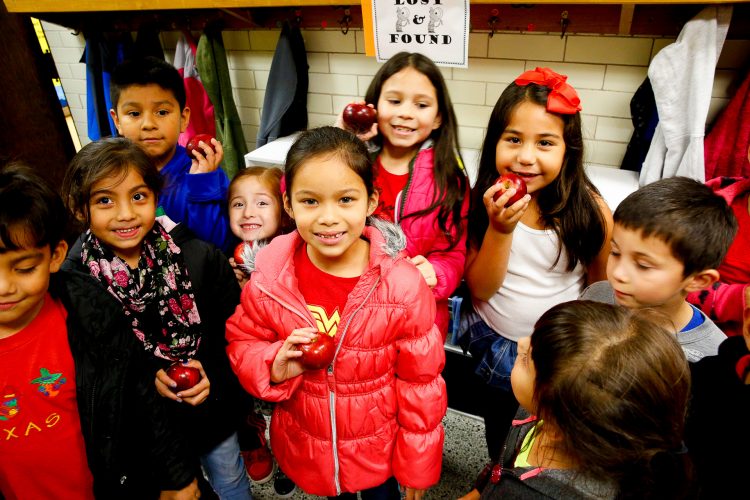 Beaupre students get ready for the Great Apple Crunch. 