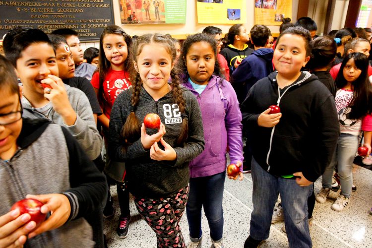 Beaupre students get ready for the Great Apple Crunch. 