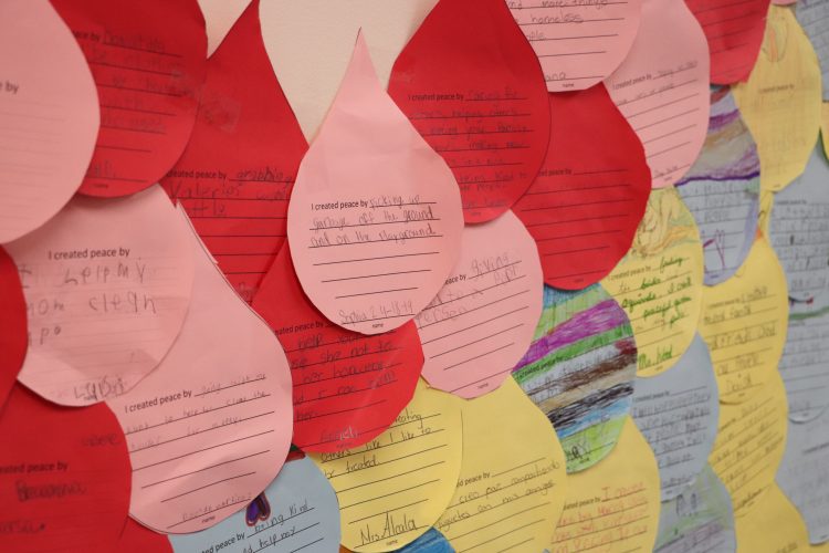 Acts of peace were displayed as a community in the shape of a peace dragon.