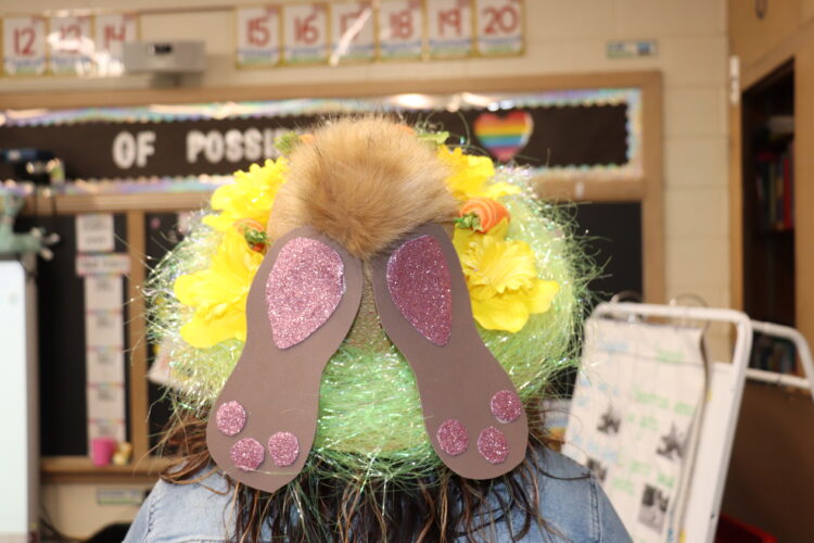 Mrs. Perri's hat - a bunny going doing a rabbit hole!
