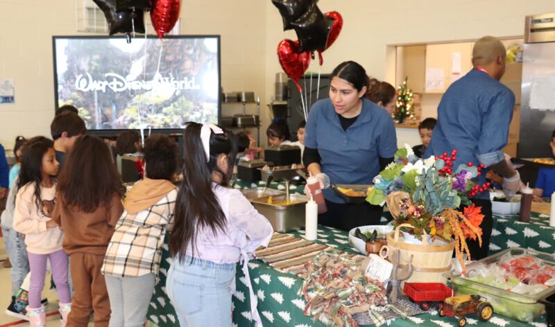 Chef Cam and Whitson's staff serve Kindergarteners and 1st graders during their lunch period.