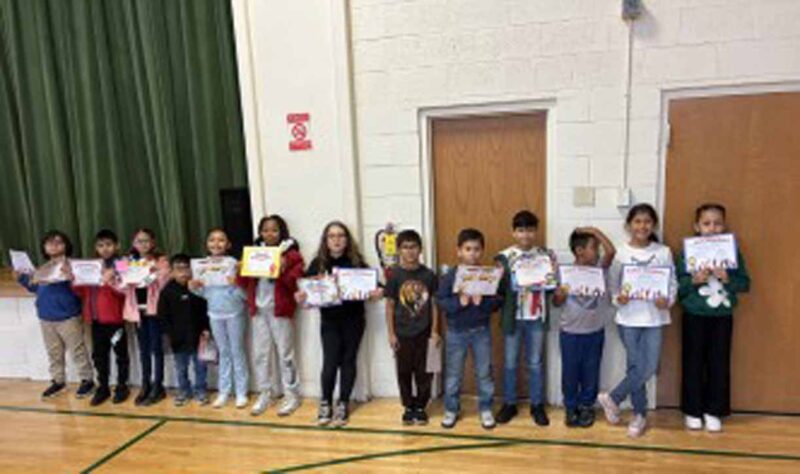 Students with their awards at the quarter 1 assembly.