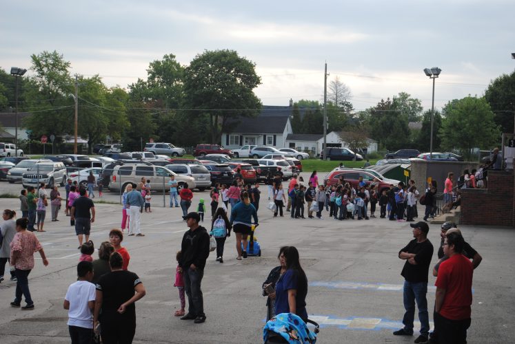 Students lined up with their teacher.
