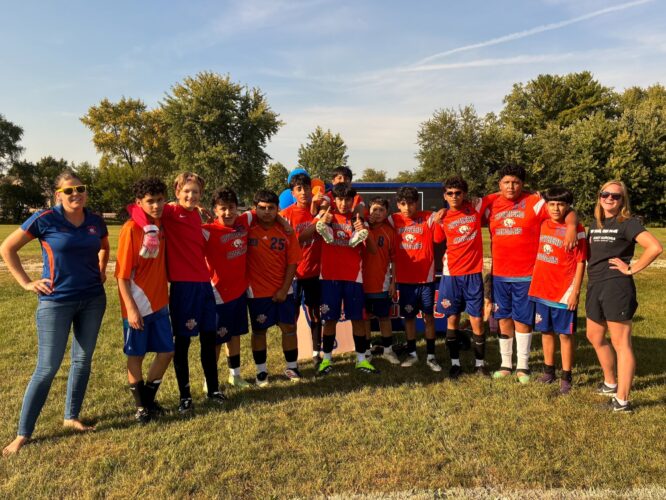 8th Grade Boys Soccer team with their coaches Ms. Cortez and Ms. McKay