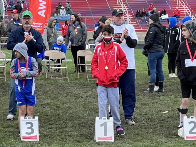 Juan Valerio takes first in the 100 meter race
